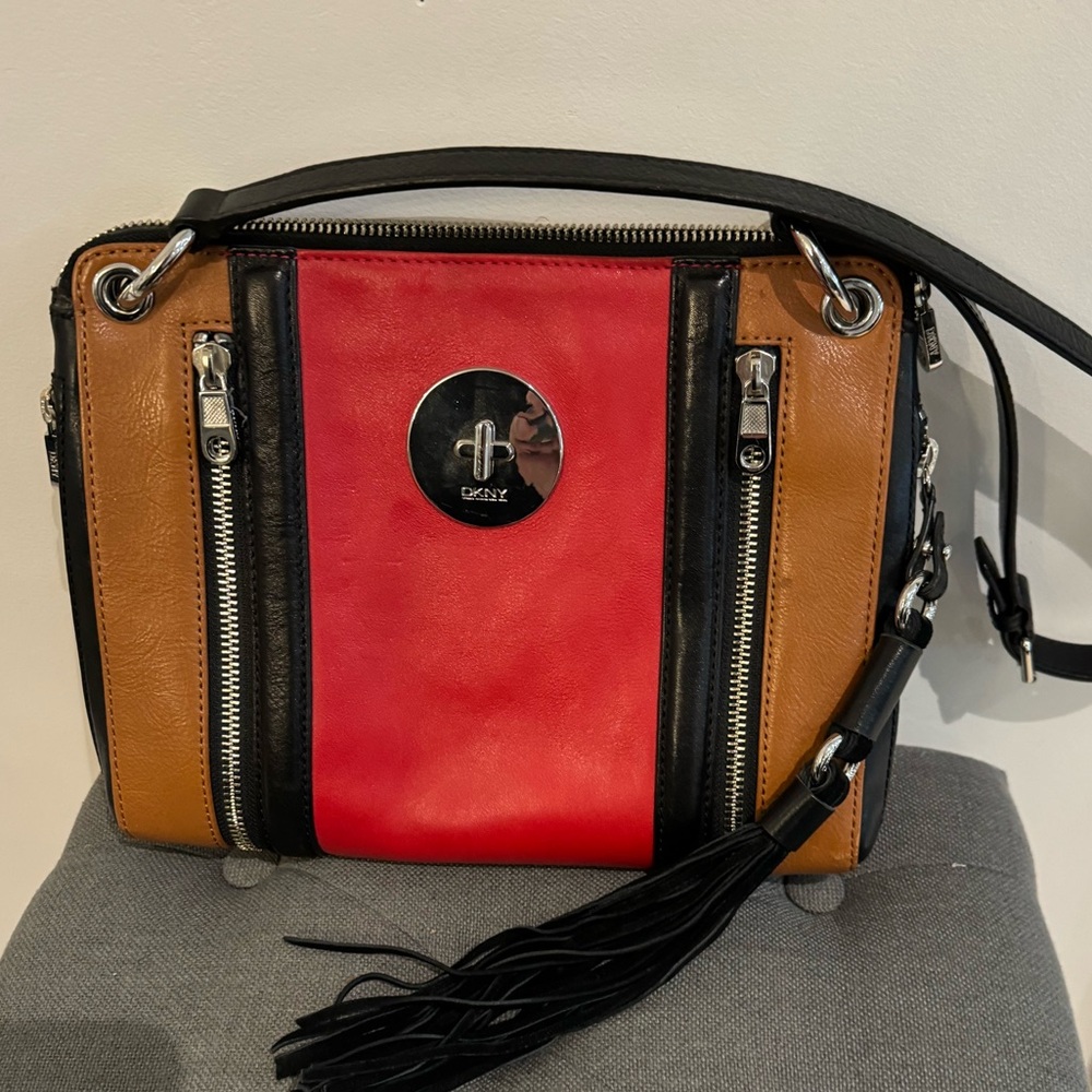 Excellent condition DKNY clutch and shoulder bag in one.